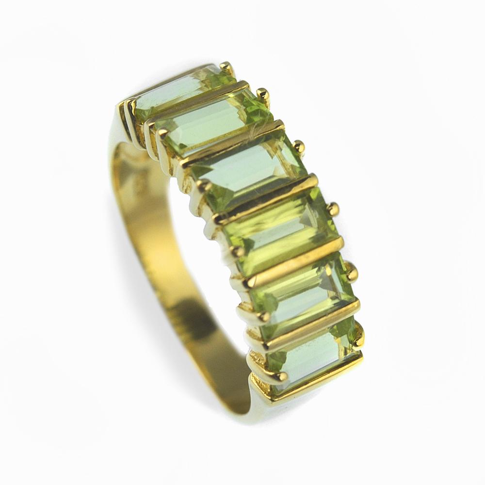 Peridot Baguette Ring featuring multiple rectangular peridot stones set in a gold-plated sterling silver band designed for female jewelry enthusiasts.